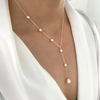 Collar con colgantes vintage y perlas