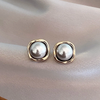 Pendientes elegantes con perla negra